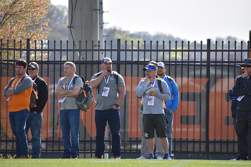 High school coaches watch Tennessee's football practice on April 5, 2018.
