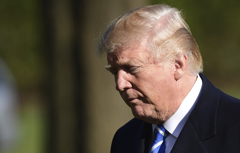 President Donald Trump walks from Marine One on the South Lawn of the White House in Washington, Thursday, April 5, 2018, after returning from a trip to West Virginia. (AP Photo/Susan Walsh)