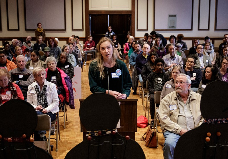 GPS student Nikki Goldbach addresses cardboard cutouts of absent lawmakers during a town hall to discuss gun violence at St. Paul's Episcopal Church on Saturday, April 7, 2018, in Chattanooga, Tenn. Chattanooga Students Leading Change hosted the town hall to discuss issues with elected officials.