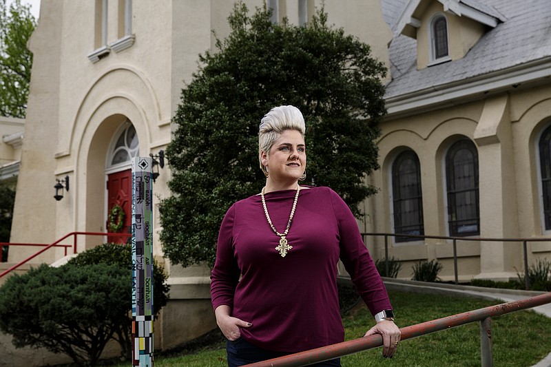 Anna Golladay poses for a portrait outside of St. Marks United Methodist Church on Thursday, April 5, 2018, in Chattanooga, Tenn. Golladay served as a pastor at St. Marks until she was fired in February for officiating a same-sex marriage, which is not allowed by the United Methodist Church's laws. Golladay continues to be involved at St. Marks, which belongs to the Reconciling Ministries Network and advocates for LGBTQ church members.