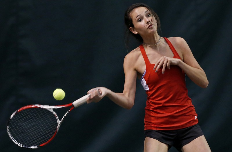 Baylor School's Carolyn Reid hits a forehand against GPS's Corinne Spann during their Friday singles match in the Rotary Tennis Tournament. Spann was the Girls' A runner-up at No. 6 singles Saturday, and Reid was a doubles finalist with Anna Hawkins.