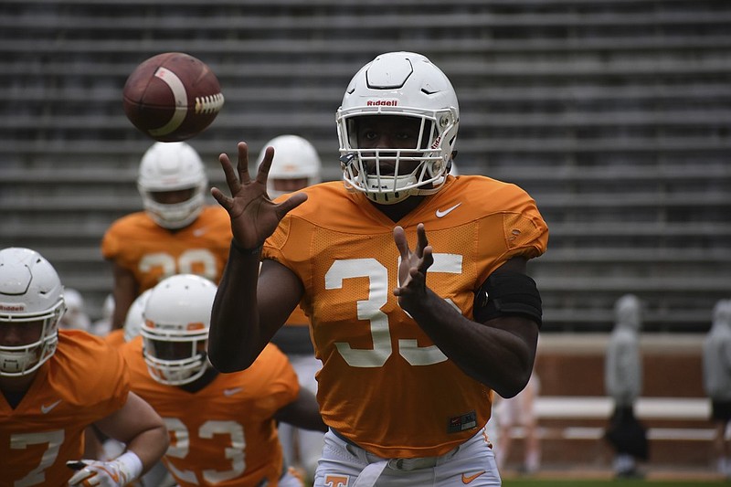 Tennessee linebacker Daniel Bituli works through a drill before the Vols' scrimmage Saturday at Neyland Stadium. Although first-year coach Jeremy Pruitt was scant on details about the scrimmage, Tennessee's first this spring, he did express disappointment in some of the body language players showed. (Photo by David Cobb/Times Free Press)