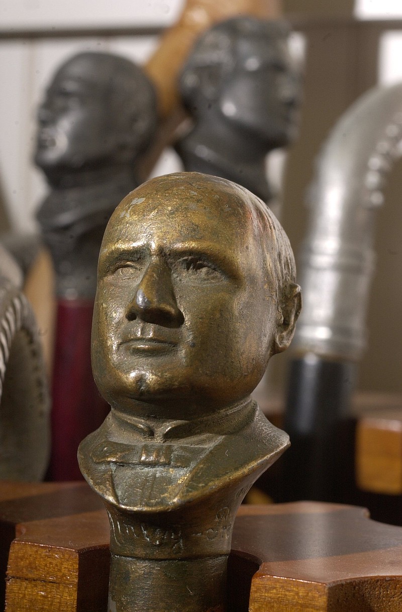 The likeness of 25th President William McKinley is seen on a cane head. In Arcata, Calif., though, the former president's statue is being threatened for removal.