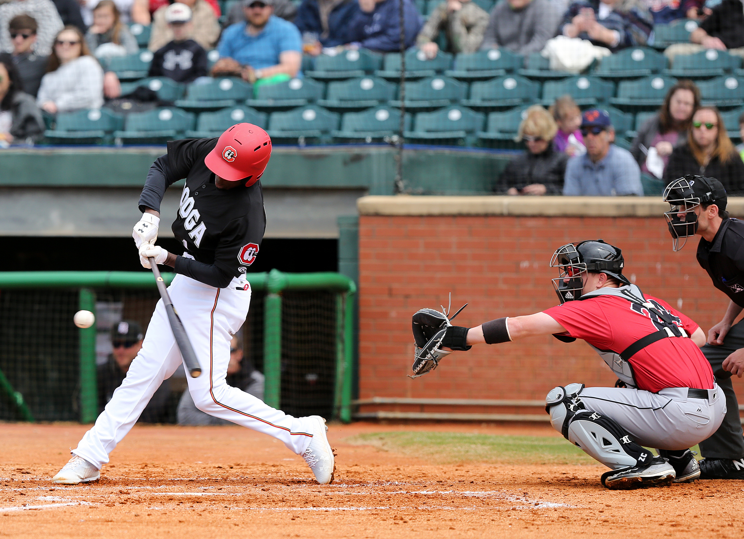 Chattanooga Lookouts' Nick Gordon (1) makes contact with the ball Sunday, April 8, 2018 during the Lookouts game against the Barons at AT&T Field in Chattanooga, Tenn.