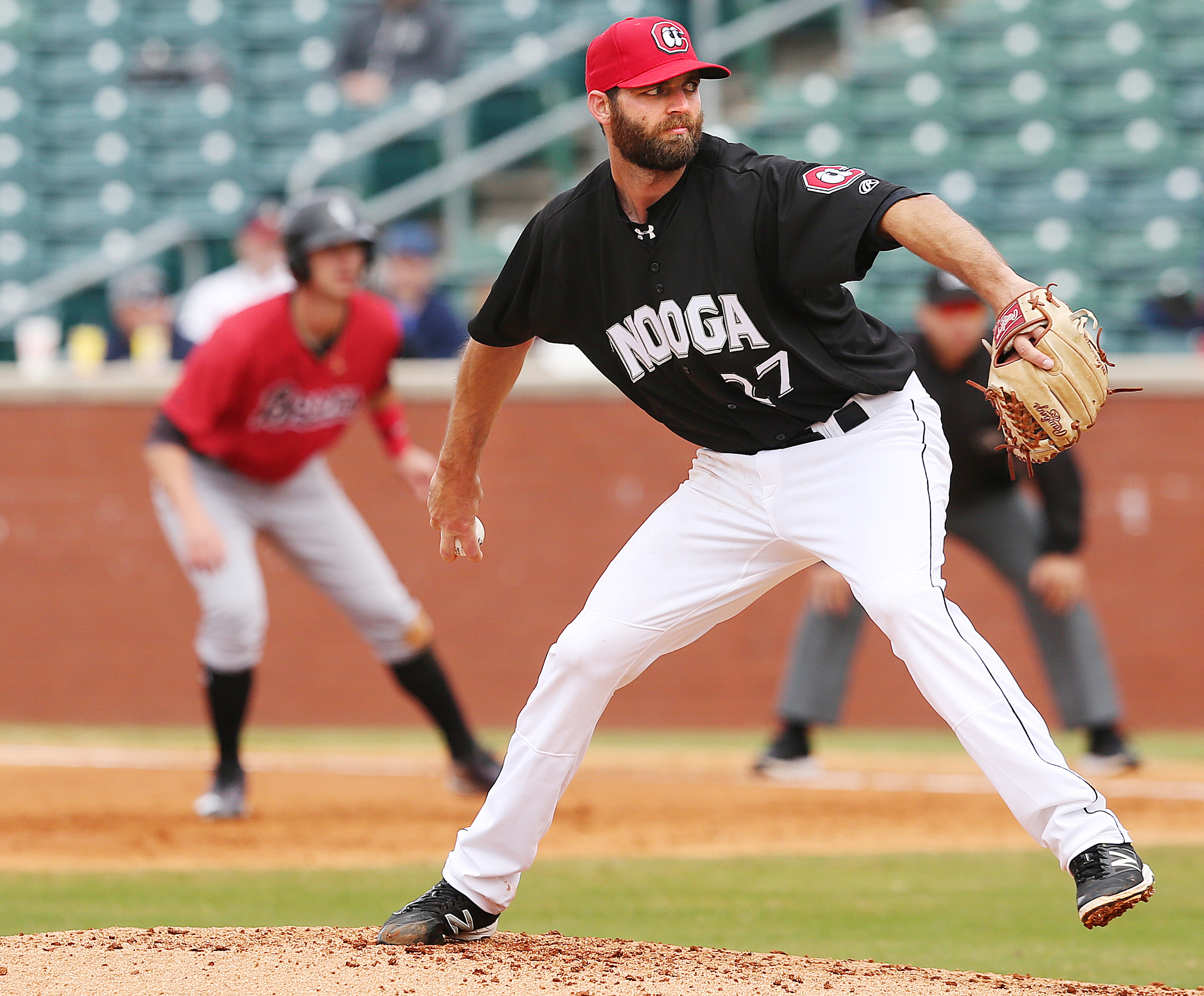 Chattanooga Lookouts' Randy LeBlanc (27) pitches Sunday, April 8, 2018 during the Lookouts game against the Barons at AT&T Field in Chattanooga, Tenn.