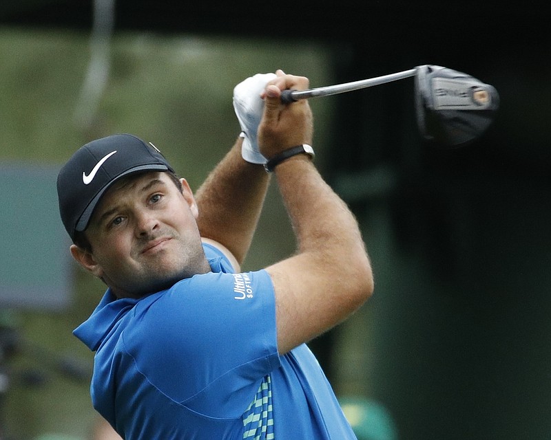 Patrick Reed hits a drive on the 18th hole during the third round at the Masters golf tournament Saturday, April 7, 2018, in Augusta, Ga. (AP Photo/Charlie Riedel)