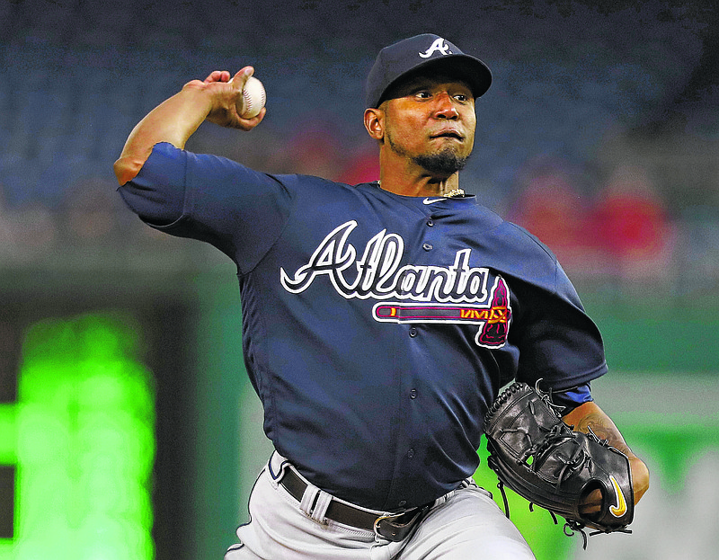 Atlanta Braves starting pitcher Julio Teheran (49) throws against the Washington Nationals during the first inning of a baseball game at Nationals Park, Monday, April 9, 2018, in Washington. (AP Photo/Pablo Martinez Monsivais)