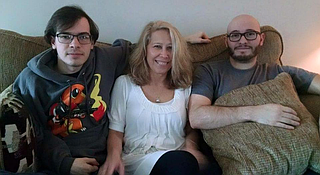 Casey, Vi, and Chad Lawhorn at a family holiday gathering.  
