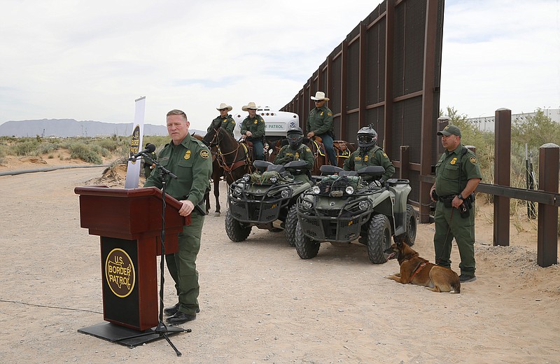Aaron Hull, chief patrol agent of the U. S. Customs and Border Protection's El Paso Sector, speaks where construction on a new segment of the border wall will be built, near Santa Teresa, N.M., Monday, April 9, 2018.