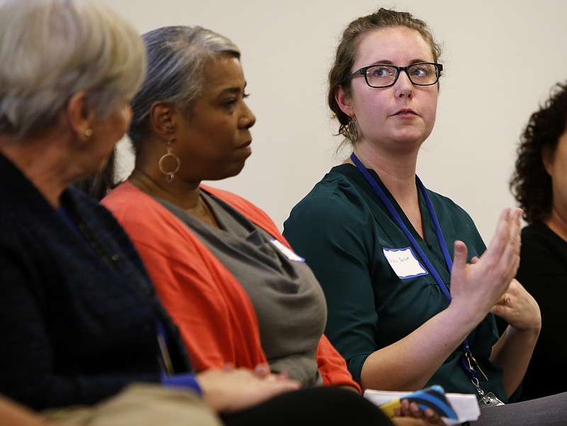 Andrea Bartlett, with the Chattanooga Public Library, speaks during a panel discussion during a town hall on making the city more livable to seniors at the Children's Advocacy Center of Hamilton County on Wednesday, April 11, 2018 in Chattanooga, Tenn.