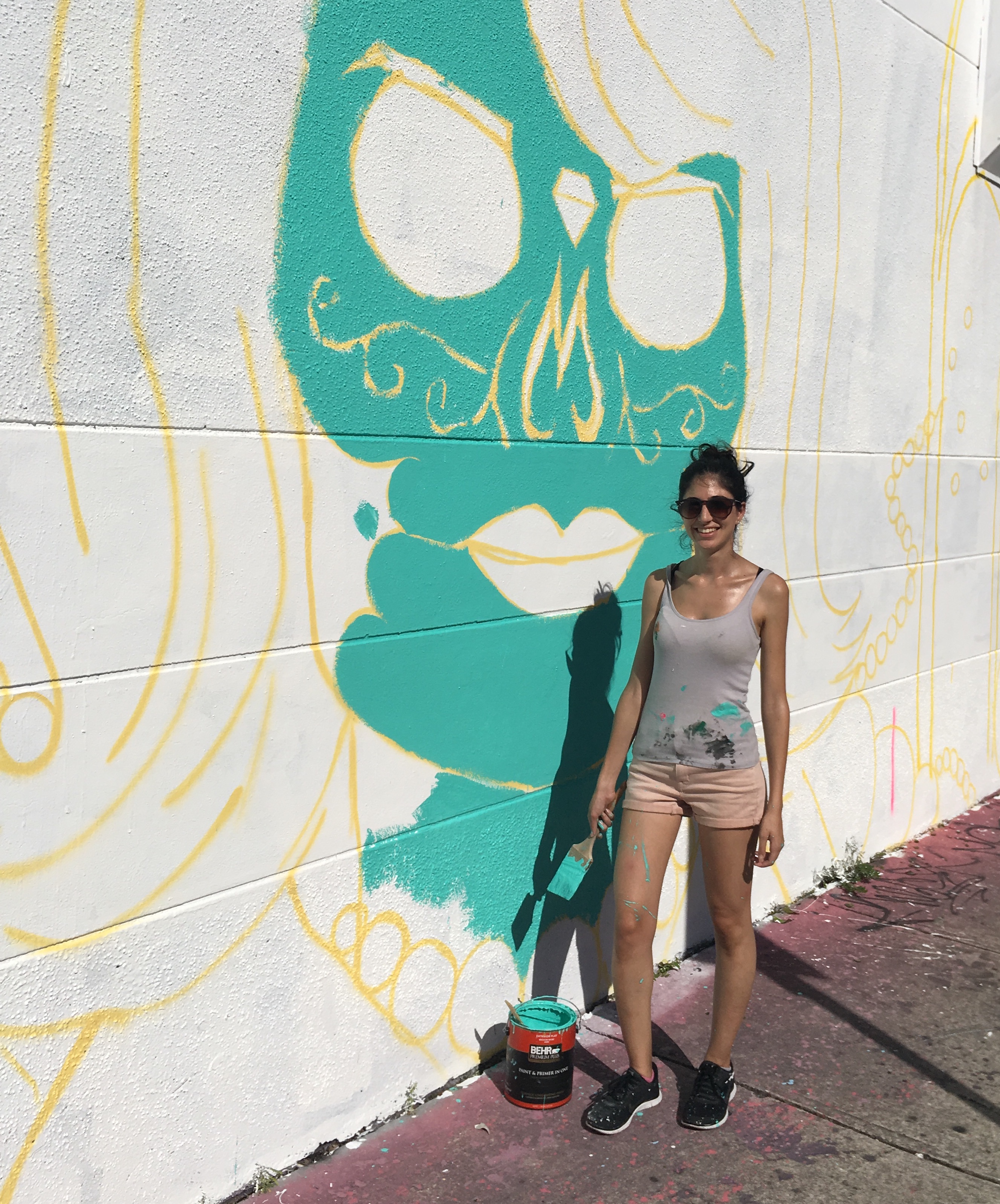 Cloe Hakakian is one of the ambitious muralists using warehouse walls in the Wynwood Art District as a canvas. Her newest work will feature powerful 20th Century women in a Mexcan Day of the Dead motif. It will be 50 feet long. (Photo by Martin W.G. King)