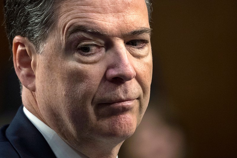  In this June 8, 2017, file photo, former FBI director James Comey testifies before the Senate Select Committee on Intelligence, on Capitol Hill in Washington. Comey blasts President Donald Trump as unethical and "untethered to truth" and his leadership of the country as "transactional, ego driven and about personal loyalty." Comey's comments come in a new book in which he casts Trump as a mafia boss-like figure who sought to blur the line between law enforcement and politics and tried to pressure him regarding the investigation into Russian election interference. (AP Photo/J. Scott Applewhite)