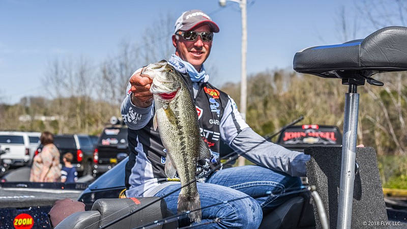 First-day leader Andy Morgan of Dayton, Tenn., also leads after the second day Friday in the FLW Tour bass tournament on Lake Cumberland in Kentucky.