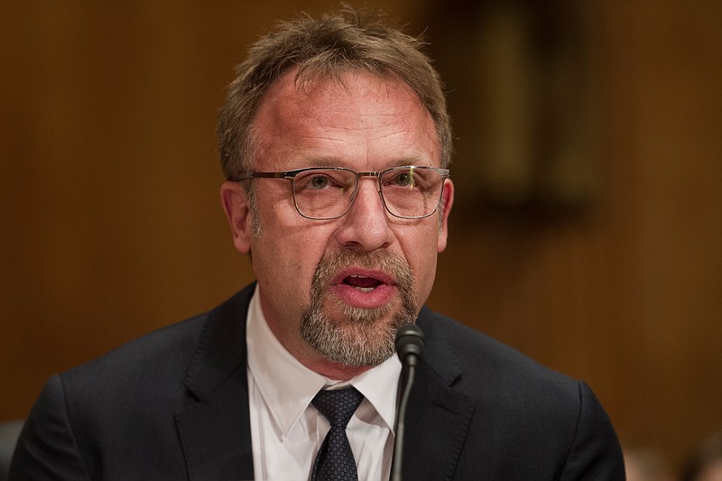 In this Jan. 10, 2017, file photo Backpage.com CEO Carl Ferrer appears before the Senate Homeland Security and Governmental Affairs Permanent subcommittee on Investigations looking into Backpage.com. Ferrer will serve no more than five years in state prison under a plea agreement announced Thursday, April 12, 2018. (AP Photo/Cliff Owen, file)