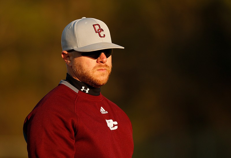 Dade County baseball coach Aaron Simmons watches from 3rd base during their prep baseball game against LFO at Dade County High School on Thursday, March 8, 2018, in Trenton, Ga. 