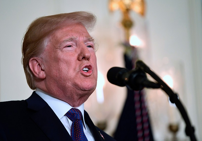 In this April 13, 2018, file photo, President Donald Trump speaks in the Diplomatic Reception Room of the White House in Washington. Trump said Sunday, April 15, 2018, that all lawyers are now "deflated and concerned" by the FBI raid on his personal attorney Michael Cohen's home and office. (AP Photo/Susan Walsh, File)