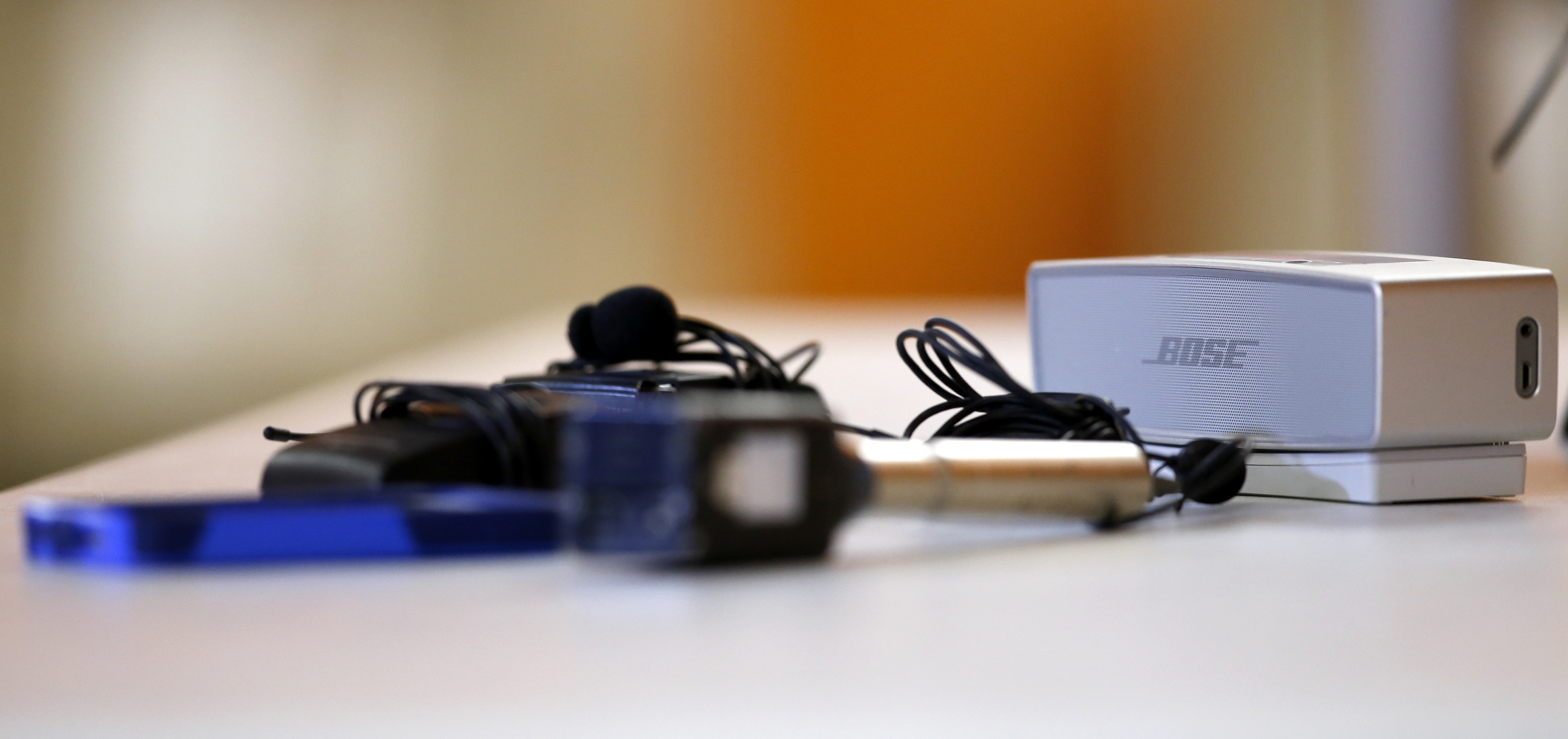 Recording devices are seen in front of a speaker as the second recorded phone call between East Ridge Mayor and District 8 county commissioner candidate Brent Lambert and incumbent Tim Boyd plays during a press conference in The Orange Room at the East Ridge Community and Senior Center on Monday, April 16, 2018 in East Ridge, Tenn. Tim Boyd was indicted for extortion.