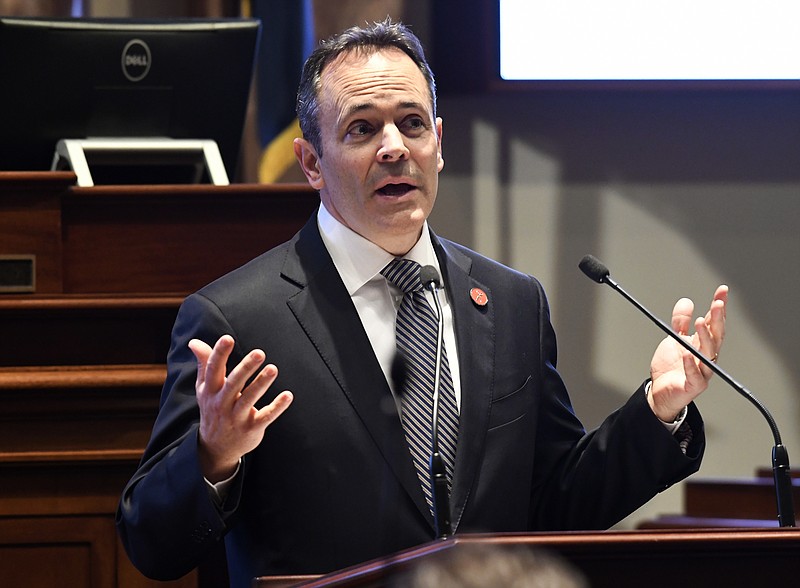 In this Jan. 16, 2018, file photo, Kentucky Gov. Matt Bevin speaks to a joint session of the General Assembly at the Capitol, in Frankfort, Ky. Bevin apologized Sunday, April 15, for saying that children were sexually abused because they were left home alone while teachers rallied to ask lawmakers to override his vetoes. The Republican issued his apology in a nearly four-minute video posted online, saying "it is not my intent to hurt anybody in this process, but to help us all move forward together." (AP Photo/Timothy D. Easley, File)