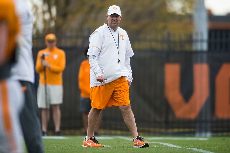 In this March 27, 2018, file photo, Tennessee head coach Jeremy Pruitt walks on the field during NCAA college football practice in Knoxville, Tenn. (Caitie McMekin/Knoxville News Sentinel via AP, File)