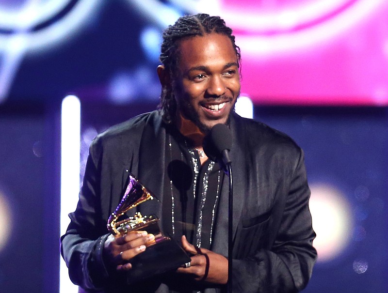 In this Jan. 28, 2018, file photo, rapper Kendrick Lamar accepts the award for best rap album for "Damn" at the 60th annual Grammy Awards in New York. On Monday, April 16, 2018, Lamar won the Pulitzer Prize for music for his album "Damn." (Photo by Matt Sayles/Invision/AP, File)