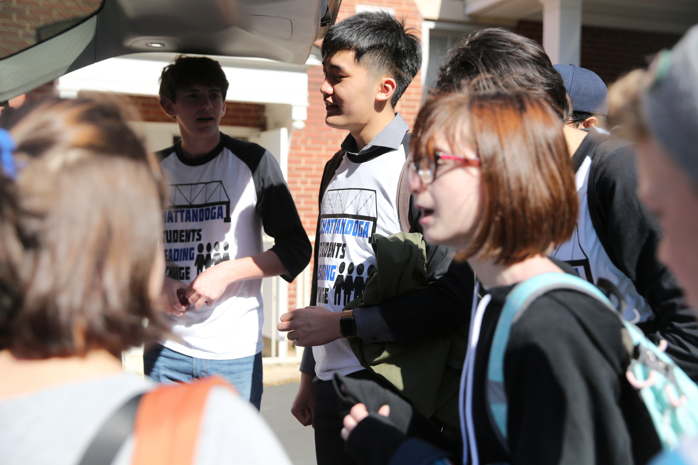 Allen Liu, 18, chats with other students as they prepare to take a trip to Washington D.C. to speak with lawmakers about school safety Wednesday, April 18, 2018 at First Christian Church in Chattanooga, Tenn. Liu, a senior at McCallie School, is one of two van-loads of local students making the trip.