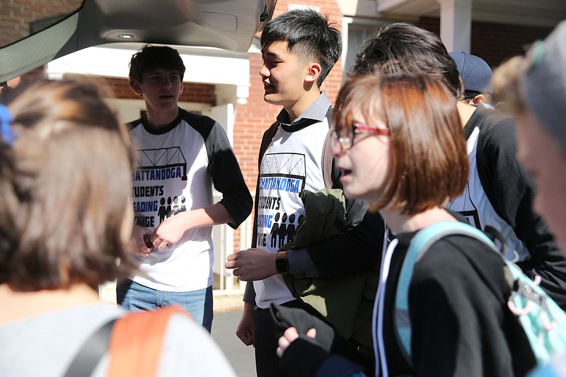 Allen Liu, 18, chats with other students as they prepare to take a trip to Washington D.C. to speak with lawmakers about school safety Wednesday, April 18, 2018 at First Christian Church in Chattanooga, Tenn. Liu, a senior at McCallie School, is one of two van-loads of local students making the trip. 