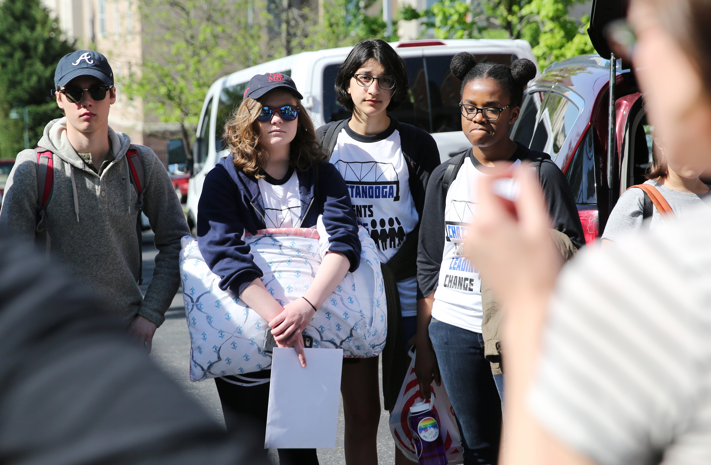 Trey Lydon, 16, Grace Bostock, 16, Anika Iqbal, 16, and Lauren Tolbert, 17, listen to instructions before getting in vans Wednesday, April 18, 2018 at First Christian Church in Chattanooga, Tenn. The group of students is among others from various high schools around Chattanooga who are heading to Washington D.C. to meet with Senator Bob Corker and other federal lawmakers about school safety.