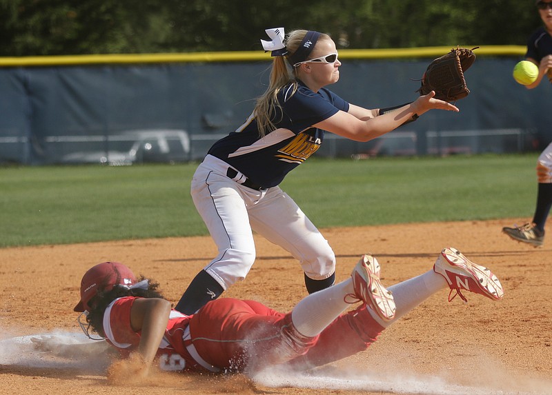 Ooltewah runner Alyssa White dives to third to avoid a pickoff throw to Walker Valley third baseman Miranda Young during their prep softball game at Walker Valley High School on Wednesday, April 18, 2018, in Charleston, Tenn. 