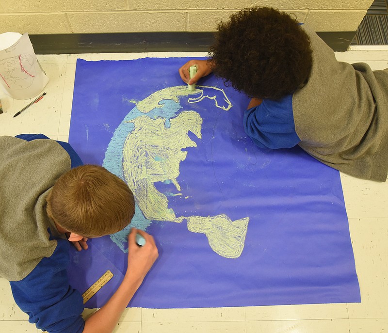 Red Bank Middle School students in 2016 worked on an Earth Day poster.