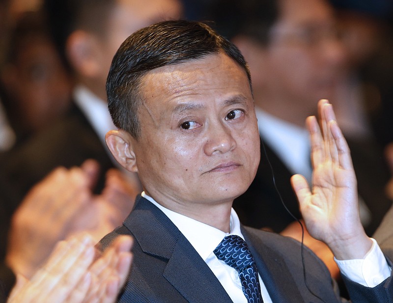 
              Founder and chairman of Alibaba Jack Ma arrives for signing the memorandums of understanding linked to the investment in Thailand,  during a press conference Bangkok, Thailand, Thursday, April 19, 2018. (AP Photo/Sakchai Lalit)
            