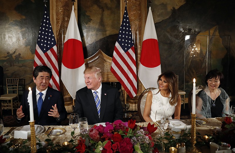 President Donald Trump and first lady Melania Trump host Japanese Prime Minister Shinzo Abe and his wife Akie Abe for dinner at Trump's private Mar-a-Lago club, Wednesday, April 18, 2018, in Palm Beach, Fla. (AP Photo/Pablo Martinez Monsivais)