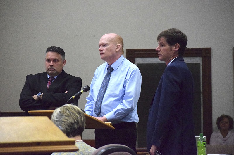 From left, defense attorney Clancy Covert, defendant Douglas Alvey and defense attorney Lee Ortwein on Thursday, April 19, 2018, listen to Criminal Court Judge Justin Angel during a bench hearing on Alvey's Fifth Amendment rights not to testify in his own defense. Testimony in Alvey's first-degree murder trial began on Wednesday in Dayton, Tenn. The defense rested its case after the bench hearing.