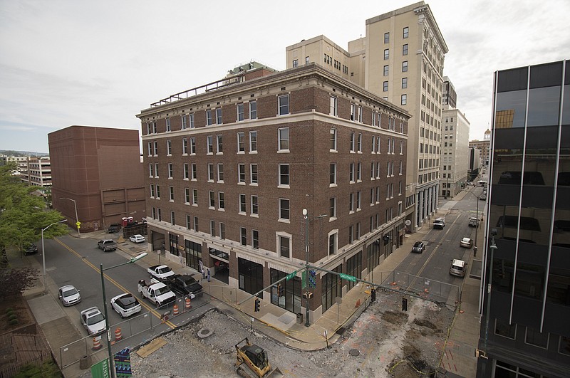 Staff file photo / The Clemons building, renovated into an apartment building two years ago, likely will become a boutique hotel.