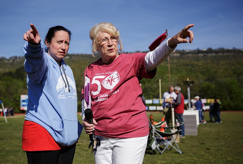 Coordinator Judy Rogers, right, directs Patrice Schermer before the 50th Annual Area 4 Special Olympics at Red Bank High School on Saturday, April 21, 2018, in Red Bank, Tenn. The event marked 50 years of competition and the retirement of Area 4 coordinator Rogers.