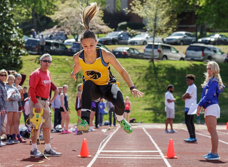 Walker Valley's Mikayla Gale competes in the triple jump during the Mid-South track and field meet at McCallie School on Saturday.