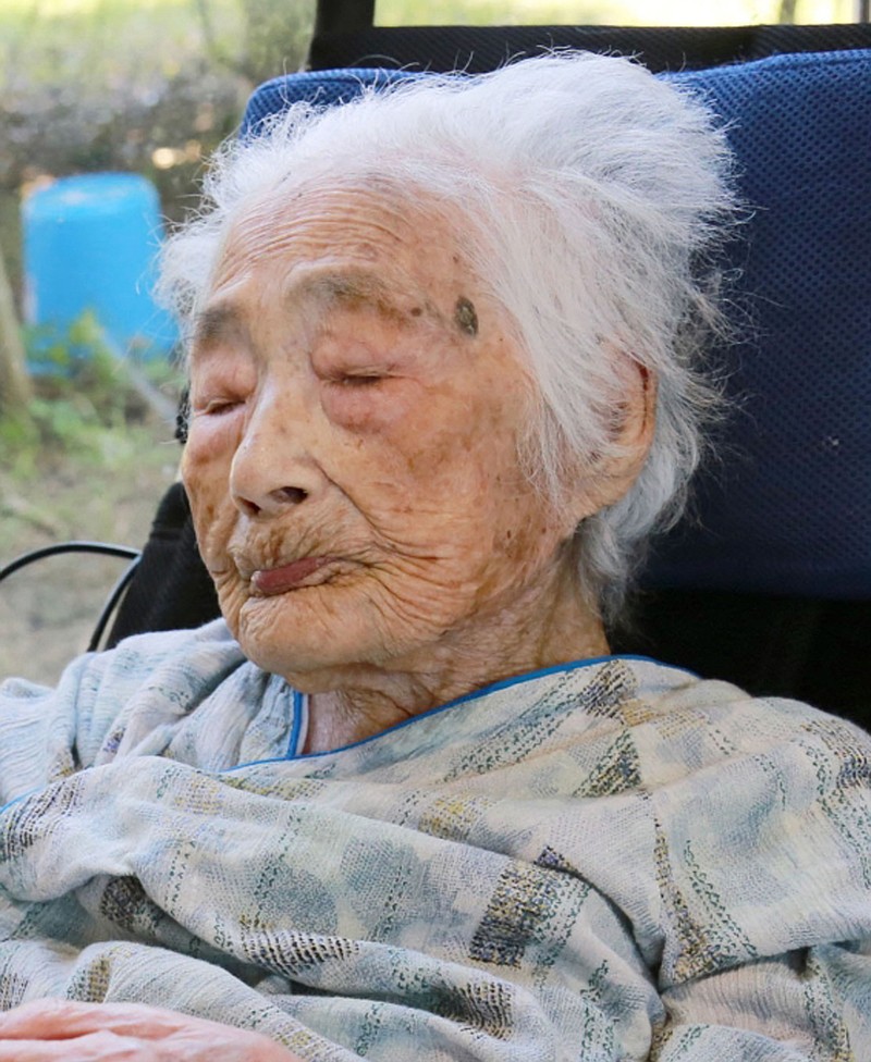 This Sept. 2015 photo shows Nabi Tajima, the world's oldest person, a 117-year-old Japanese woman. Tajima died of old age, at 117, in a hospital Saturday evening, April 21, 2018, in the town of Kikai in southern Japan, town official Susumu Yoshiyuki confirmed. She had been hospitalized since January. (Kikai Town/Kyodo News via AP)

