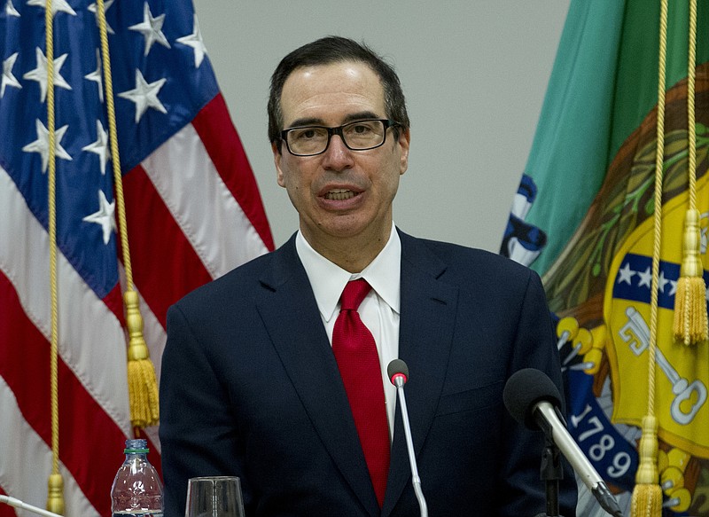 Treasury Secretary Steve Mnuchin speaks during a news conference at World Bank/IMF Spring Meetings, in Washington, Saturday, April 21, 2018. ( AP Photo/Jose Luis Magana)

