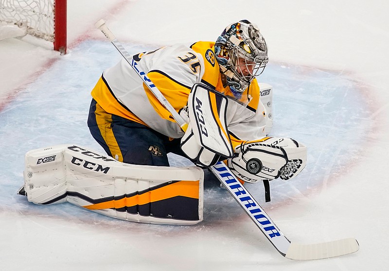 Nashville Predators goaltender Pekka Rinne makes a save against the Colorado Avalanche during the first period in Game 6 of an NHL hockey first-round playoff series Sunday, April 22, 2018, in Denver. (AP Photo/Jack Dempsey)