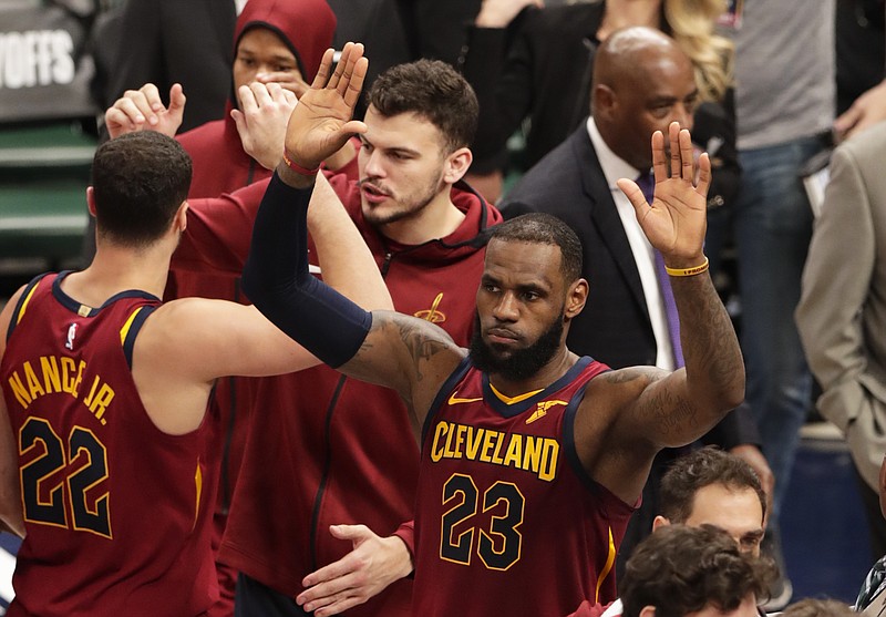 Cleveland Cavaliers forward LeBron James (23) celebrates following Game 4 of an NBA basketball first-round playoff series against the Indiana Pacers in Indianapolis, Sunday, April 22, 2018. The Cavaliers defeated the Pacers 104-100. (AP Photo/Michael Conroy)