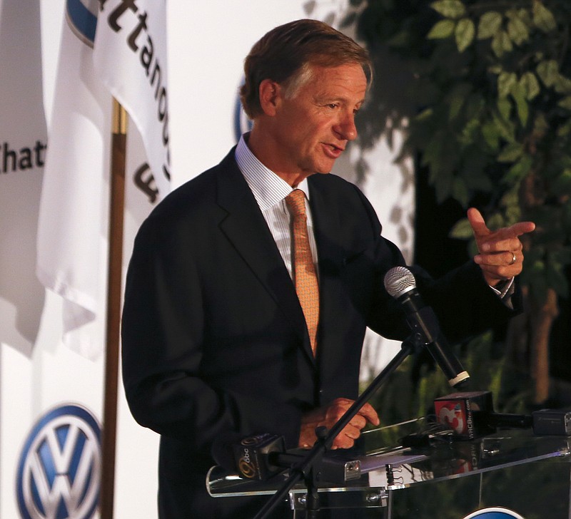 Tennessee Gov. Bill Haslam speaks during a news conference to unveil VW's plans to build the new five-seat Atlas in Chattanooga at the Volkswagen Conference Center on Monday, March 19, 2018, in Chattanooga, Tenn.