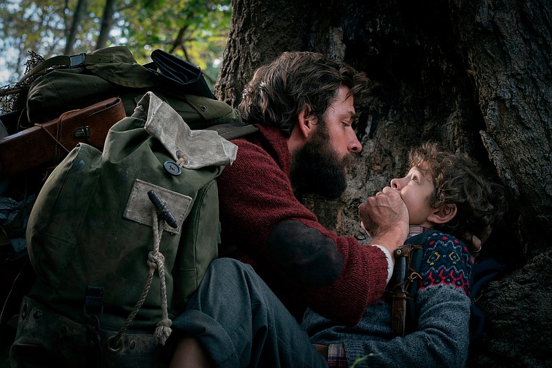 This image released by Paramount Pictures shows John Krasinski, left, and Noah Jupe in a scene from "A Quiet Place." (Jonny Cournoyer/Paramount Pictures via AP)
