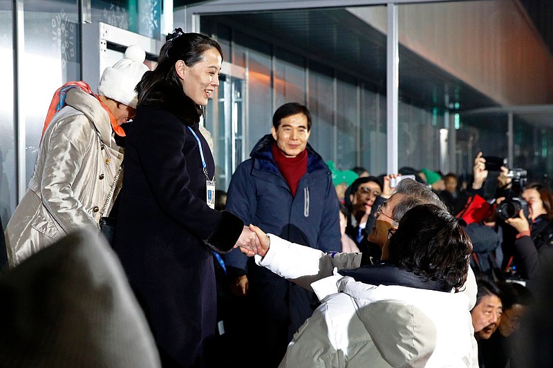 FILE - In this Feb. 9, 2018 file photo, Kim Yo Jong, left, sister of North Korean leader Kim Jong Un, shakes hands with South Korean President Moon Jae-in at the opening ceremony of the 2018 Winter Olympics in Pyeongchang, South Korea. North Korea's abrupt diplomatic outreach in recent months comes after a flurry of weapons tests that marked 2017, including the underground detonation of an alleged thermonuclear warhead and three launches of developmental ICBMs designed to strike the U.S. mainland. Inter-Korean dialogue resumed after Kim in his New Year’s speech proposed talks with the South to reduce animosities and for the North to participate in February’s Winter Olympics in Pyongchang. North Korea sent hundreds of people to the games, including Kim's sister, who expressed her brother's desire to meet with Moon for a summit. South Korean officials later brokered a potential summit between Kim and Trump. (AP Photo/Patrick Semansky, Pool, File)