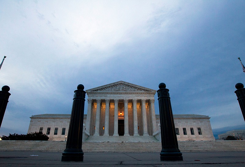 In this Feb. 1, 2017, file photo, the Supreme Court is seen in the morning in Washington. The Supreme Court has so far had little to say about Donald Trump's time as president. That's about to change. The justices' first deep dive into a Trump administration policy comes in a dispute over the administration's ban on travel from some countries with majority Muslim populations. (AP Photo/Jose Luis Magana, File)