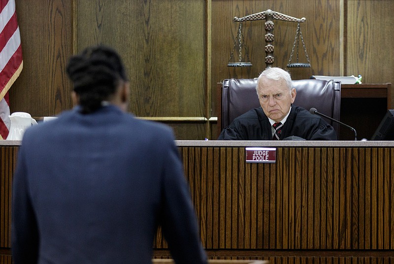 Judge Don Poole listens as Woodmore bus driver Johnthony Walker gives a statement during Walker's sentencing hearing at the Chattanooga-Hamilton County Courts Building on Tuesday, April 24, 2018, in Chattanooga, Tenn. Walker was convicted in February of criminally negligent homicide and a host of lesser charges, and he was sentenced Tuesday to four years in prison.
