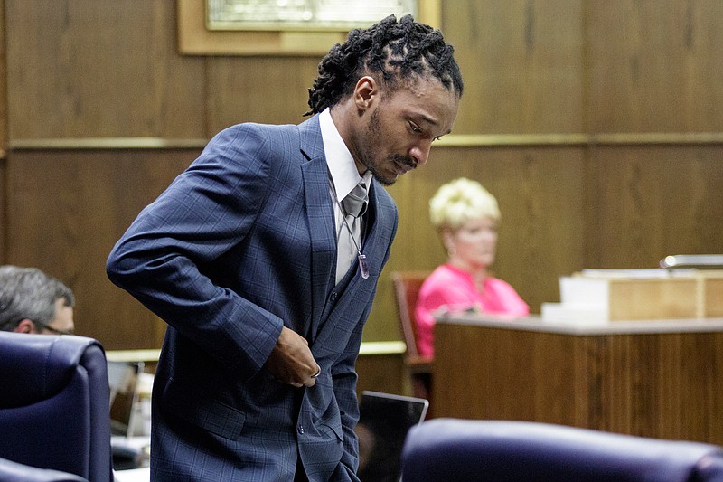 Woodmore bus driver Johnthony Walker walks back to his seat after giving a statement during his sentencing hearing in Judge Don Poole's courtroom at the Chattanooga-Hamilton County Courts Building on Tuesday, April 24, 2018, in Chattanooga, Tenn. Walker was convicted in February of criminally negligent homicide and a host of lesser charges, and he was sentenced Tuesday to four years in prison.

