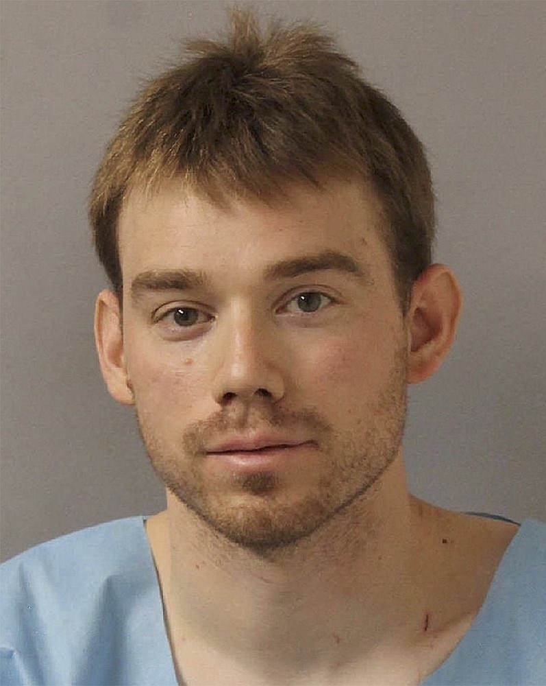 In this image released by the Metro Nashville Police Department, Travis Reinking poses for a booking photo on Monday, April 23, 2018, in Nashville, Tenn.