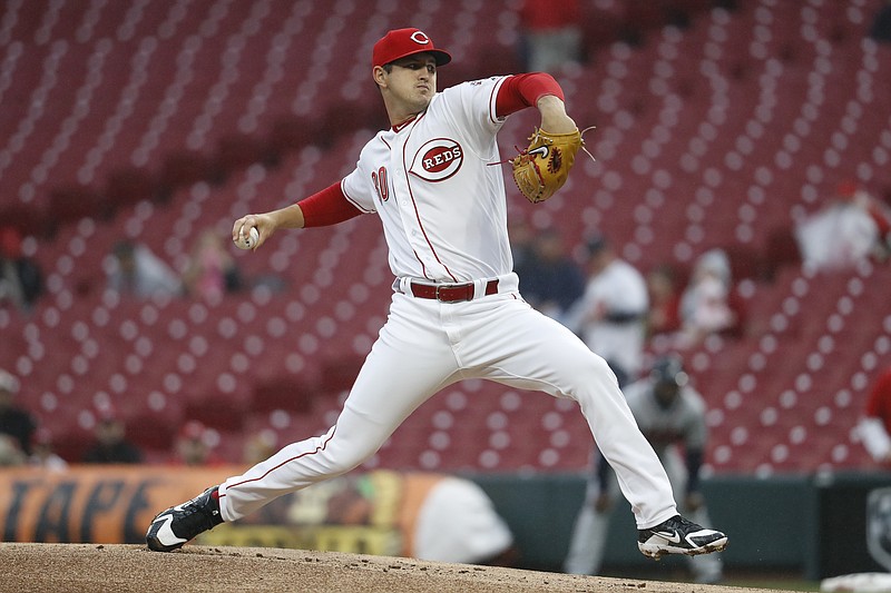 Cincinnati Reds starting pitcher Tyler Mahle throws during the first inning of the team's baseball game against the Atlanta Braves, Tuesday, April 24, 2018, in Cincinnati. (AP Photo/John Minchillo)