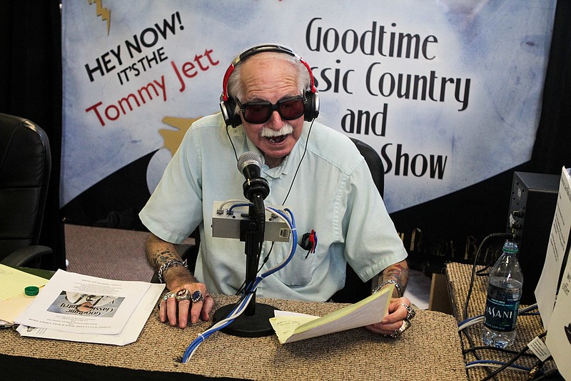 In this July 22, 2014, staff file photo, Tommy Jett opens his weekly show on WAAK 94.7 FM with his signature "HEY NOW!" in Ringgold, Ga.