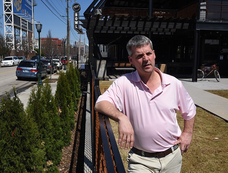 Developer John Wise stands in front of his latest Chattanooga project to open in the 1800 block of Chestnut Street. City leaders are putting together a new zoning package for the future that is based on form, instead of traditional use standards.