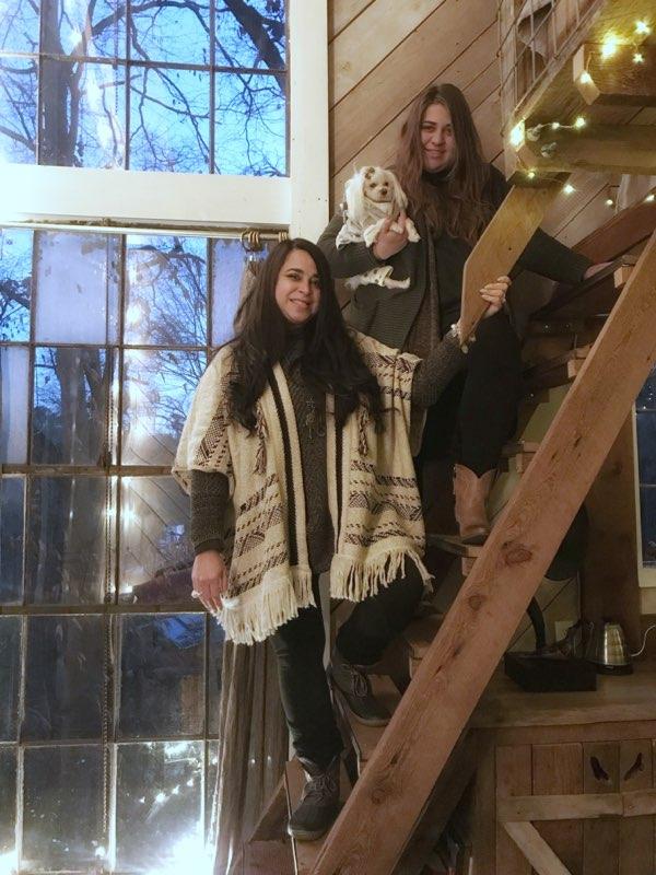 Marisol Bosque and her 20-year-old daughter Kaylin pose on the steps of the Luna Loft in Flintstone, Ga. Marisol stayed there a few nights this past January with her husband, Erney, and daughter. The family is from Miami.